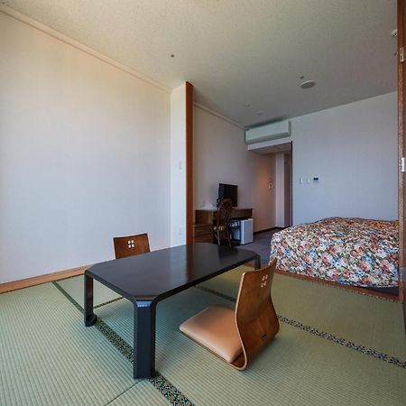 Hotel Miyuki Beach Onna Esterno foto