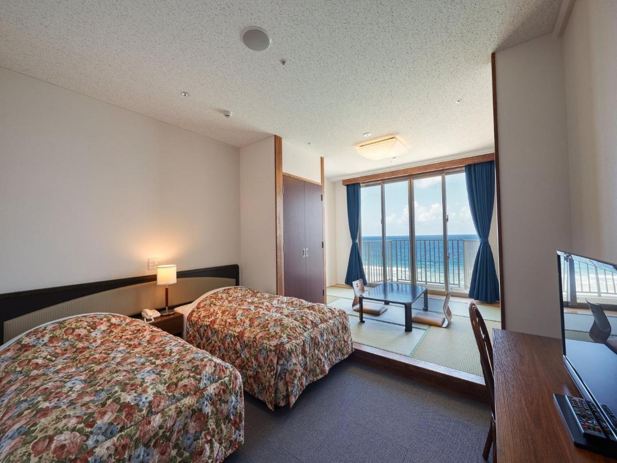 Hotel Miyuki Beach Onna Esterno foto